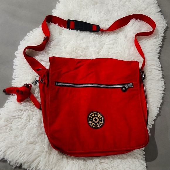 Kipling Handbags - Kipling Red Expandable Crossbody Shoulder Bag